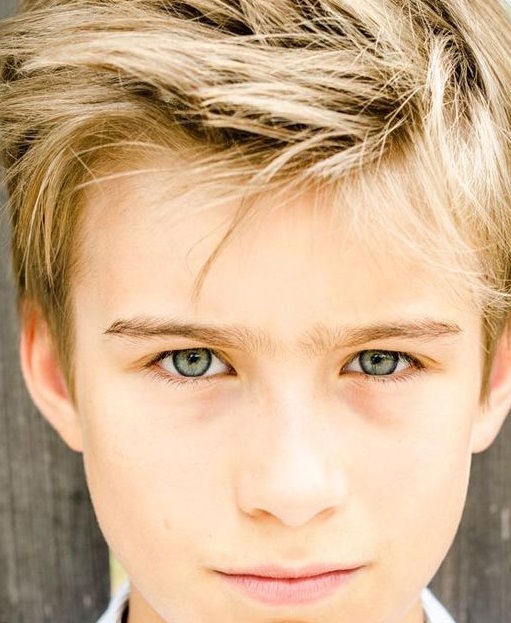 Blond boy with azur eyes